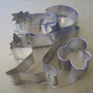 Vintage Metal Cookie Cutters Lot of 4 Reindeer Pineapple Half Moon and Cloud